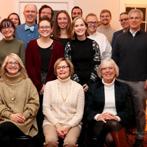 Attendees at the Phi Alpha Theta/History Department French Christmas Dinner on December 7, 2019, join for a photo at the outset of the evening. They are: (kneeling or seated, left to right) Dr. Stephen Carls, Savannah Wright, Brenda Briley, Becky Lindley, and Nancy Thomas; (standing, left to right) Camille Wehrman, Alex Anderson, Nathan Van Neste, Dr. Terry Lindley, Lillie Salazar, Sandra Allen, Robert Briley, Katie Allison, Christopher Hearn (standing behind Katie Allison), Emma Otto, Nicholas Terra, Megan Ledbetter, Nathan Heatherly, Luke Sower, Dr. Keith Bates, and Dr. David Thomas.