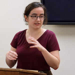 Phi Alpha Theta member Leah Atkins discusses her history honors thesis about “Poisonous Women: Gender and Power in Ancient Rome” at her thesis defense on December 9, 2019.