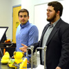 Delta-Psi Chapter President Nicholas Hancock (right) welcomes Phi Alpha Theta members to the chapter's fall initiation/plenary meeting on September 14, 2015. On the left is Vice President Allen Bradley. Photo by Elizabeth Wilson
