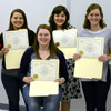 New Phi Alpha Theta members show off their certificates of membership following their induction ceremony into the national history honor society at the Delta-Psi chapter's fall meeting on September 14, 2015. They are (left to right) Gideon Ragland, Jordan Sellers, Kathryn Mitchell (seated) Priscilla Porter, Beth Adams, and Thomas Gray. Photo by Elizabeth Wilson
