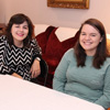 Phi Alpha Theta members Priscilla Porter (left) and Jordan Sellers await the start of the Best Chapter Award pizza supper on October 16, 2015.