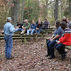 Britton Lane Battlefield Association President Jim Weaver (front left) talks about the battle of Britton's Lane during a Phi Alpha Theta-sponsored community service project at Britton's Lane on November 3, 2015.