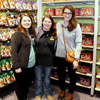 Union students (left to right) Jordan Sellers, Kathryn Mitchell, and Olivia Winters stand amidst numerous kinds of candy at Goofy's Candy Company in Disney Springs on January 7, 2016.