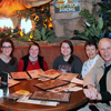 Members of the Union University delegation at the 2016 Phi Alpha Theta Biennial Convention pause for a photo at the T-Rex Café in Disney Springs on January 10, 2016. They are (left to right) Olivia Winters, Kathryn Mitchell, Jordan Sellers, Dr. Alice-Catherine Carls, and Dr. Stephen Carls,