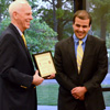 Dr. Stephen Carls (left) presents a certificate of appreciation to Allen Bradley at the history awards banquet on May 5, 2016, for his work as vice president of Phi Alpha Theta in 2015-2016. Photo by MiKalla Cotton