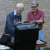 Attendees enjoy beautiful weather, great conversation, and good food at the 24th Annual Phi Alpha Theta/History Department Cookout at Dr. Stephen Carls's home on May 13, 2016.