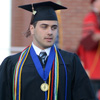 Allen Bradley returns to his seat after receiving his diploma at Union University's commencement services on May 21, 2016.