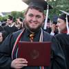History major Nicholas Hancock proudly holds his diploma following the Union University commencement services on May 21, 2016.