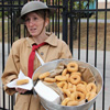 Angie Poole demonstrates the role of YMCA women who served coffee and doughnuts at train stations to departing American soldiers during the First World War. Poole's portrayal was part of a living history exhibit at Jackson's Casey Jones Railroad Museum on November 6, 2016. The Tennessee Great War Commission's World War I symposium offered several special exhibits about the home front in Tennessee during the First World War.