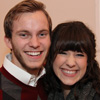 Seth Reid and his fiancï¿½e Kaylee Gibson smile for the camera at the start of the Phi Alpha Theta Christmas dinner on December 10, 2016.