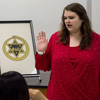 Delta-Psi Chapter Vice President Kathryn Mitchell (left) initiates Jessica Barton into Phi Alpha Theta at the society's plenary meeting on February 20, 2017. Photo by Morgan Morfe