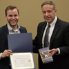 Seth Reid (left) accepts a book and a certificate of recognition from Dr. Henry Allen at the History Department Awards Banquet on May 4, 2017, for his paper presentation at the 2017 Phi Alpha Theta Regional Conference on April 1. Photo by Janelle Vest