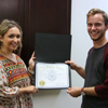 Delta-Psi Chapter President Seth Reid presents Marylee Barker with her Phi Alpha Theta certificate of membership on September 14, 2017. Photo by Hannah Kate Heckart