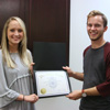 Nakota Wood accepts her Phi Alpha Theta membership certificate from Delta-Psi President Seth Reid on September 14, 2017. Photo by Hannah Kate Heckart