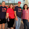 Volunteers representing Phi Alpha Theta at the “Racing So They Can Ride” event at Dick's Sporting Goods are (left to right) Dr. Henry Allen, Jessica Barton, Robert Briley, Cheyanne Harber, Dr. Alice-Catherine Carls, and Dr. Stephen Carls.