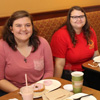 Cheyanne Harber (left to right), Jessica Barton, and Robert Briley enjoy breakfast at Panera Bread after serving as volunteers at the “Racing So They Can Ride” races on September 16, 2017.