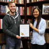 Phi Alpha Theta President Seth Reid and Vice President Katherine Cheshire proudly hold the 2017 Best Chapter Award certificate that the Delta-Psi chapter earned for the quality of its program in 2016-2017.