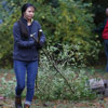 Delta-Psi Chapter Vice President Katherine Cheshire carries a tree branch to a pile for loading onto a dump truck at the History Department/Phi Alpha Theta community service project at Liberty Garden Park on November 7, 2017. Photo by Kristi Woody