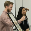 Delta-Psi President Seth Reid begins the chapter's plenary meeting on February 27, 2018. Vice President Katherine Cheshire is at his side. Photo by Janelle Vest