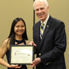 Katherine Cheshire accepts a certificate of appreciation from Dr. Stephen Carls at the history awards banquet on May 3, 2018, for her work as vice president of Union's Delta-Psi chapter of Phi Alpha Theta in 2017-2018. Photo by Catherine Carls