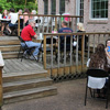 Attendees at the 26th Annual Phi Alpha Theta/History Department Cookout on May 12, 2018, enjoy their time together in the back yard of the Carls's home.