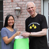 Phi Alpha Theta member Katherine Cheshire accepts a graduation gift bag from Dr. Stephen Carls at the history department cookout on May 12, 2018.