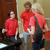 Phi Alpha Theta President Lauren Butler (left) talks to a student at the Student Life Fair on August 19, 2018 while Vice President Luke Sower listens.