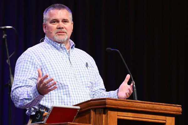 Chris Hail speaking in chapel