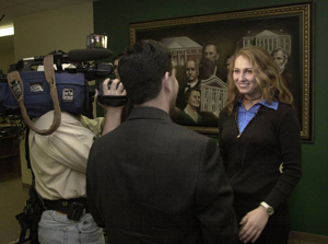Union student and Russian native Tatatia Nugmenova is interviewed by a
        reporter from WREG Channel 3 - Memphis.