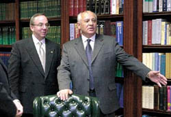 Photo by HELEN COMER/The Jackson Sun - Mikhail Gorbachev, former secretary general of the former Soviet Union, talks to students during his visit to Union University in Jackson on Tuesday. Gorbachev was in Jackson to speak at the university's fourth annual Scholarship Banquet. At left is David Dockery, president of Union University