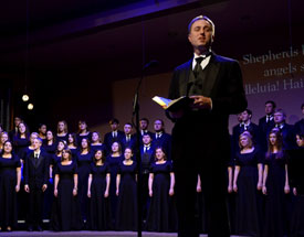 Chris Mathews, associate professor of music, in a Christmas carol during last year's "A Union Christmas." (Photo by Ebbie Davis)