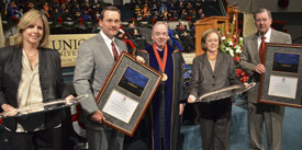 Union President David S. Dockery (center) presents the Robert E. Craig Service Award to the Dement family: Katherine and Bill Dement (left) and Beth and Sonny Dement (right). (Photo by Morris Abernathy)