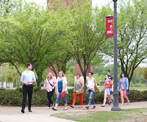 A tour group walks past Miller Tower during a campus tour. (Photo by Kristi Woody)