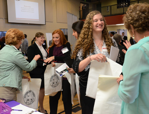 Union students visit with employers at the 2016 "College to Career: Education and Professionals Expo." This year's event will take place March 30. (Photo by MiKalla Cotton)