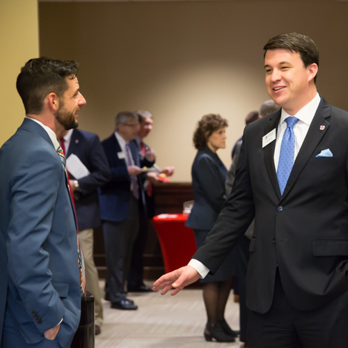 New trustees Jake Bynum (left) and Josh Dougan visit prior to the Dec. 1 meeting of Union's Board of Trustees. (Photo by Kristi Woody)