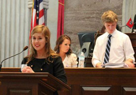 Union students Shelly Ezell (at podium) and Karl Magnuson (right) participate in the 42nd General Assembly of the Tennessee Intercollegiate State Legislature.