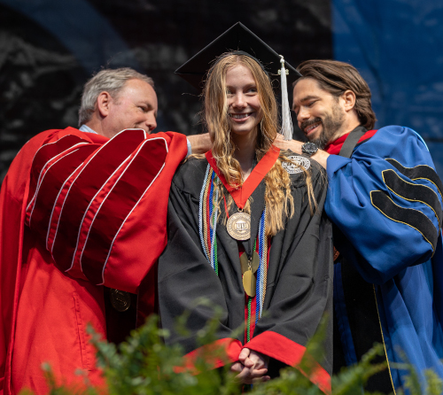 Union President Samuel W. "Dub" Oliver (left) and Provost Jacob Shatzer (right) present the Tigrett Medal to Amy De Groot. (Photo by Karley Hathcock)