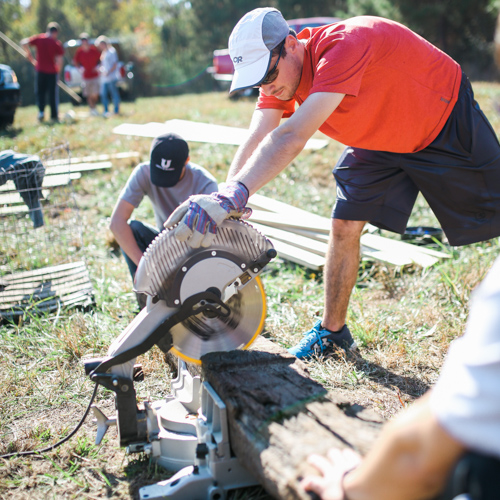 Engineering and athletic training students work on the Union University trails at the 14th annual "Campus and Community: A Day of Remembrance and Service." (Photo by Kristi Woody)
