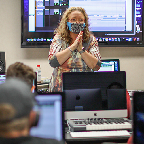 Kelly Garner, associate professor and coordinator of commercial music, teaches “Music Production and Audio Engineering” in Jennings Hall. (Photo by Kristi Woody)