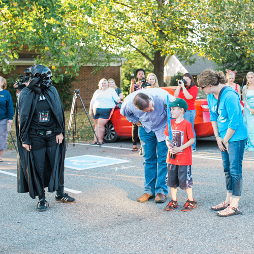 Noah Ellsworth is greeted by a student in costume as Darth Vader at his wish reveal. (Photo by Kristi Woody)