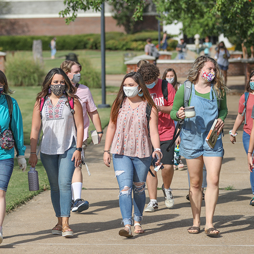 Students walk together on the first day of fall semester classes, Aug. 18, 2020. (Photo by Kristi Woody)
