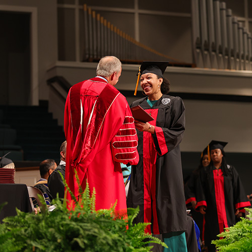 Candice Greshaw, 2022 Union graduate of organizational leadership, receives her diploma. (Photo by Suzanne Rhodes)