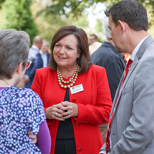 Union trustees Robyn Hari (center) and Chad Wilson (right) visit with faculty and staff during an appreciation reception Sept. 10. (Photo by Kristi Woody)