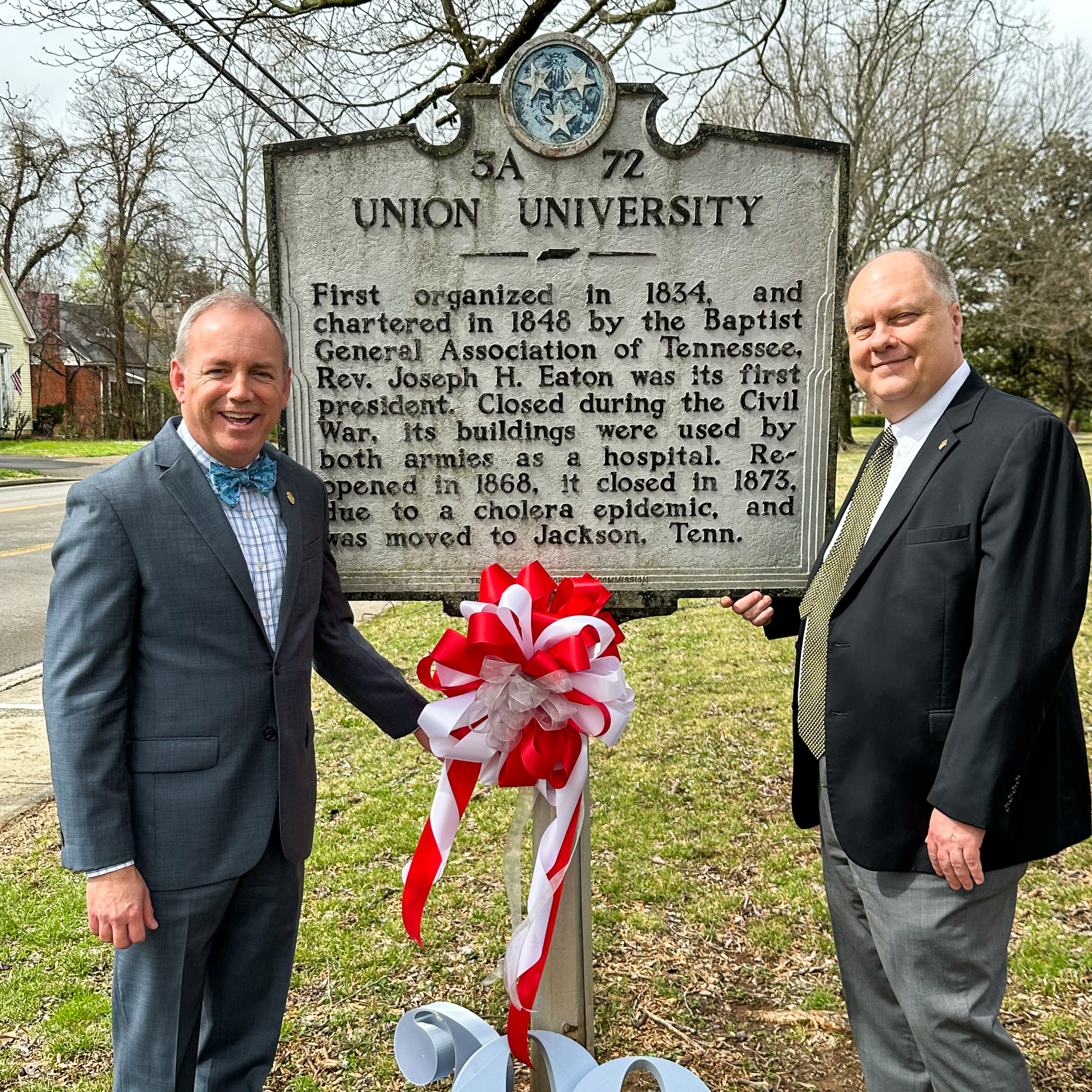 Union president, Samuel W. "Dub" Oliver, and Central Magnet School principal, John Ash, celebrate Union's Murfreesboro historic marker. 