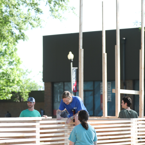 Art students construct a cathedral sculpture to show solidarity with those who have lost their churches. (Photo by Kristi Woody)