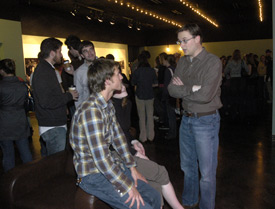 Greg Thornbury, dean of the School of Christian Studies, visits with junior Ben Glass during the grand opening of Barefoot's Joe. (Photo by Jordan Buie)