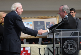 Union President David S. Dockery presents a plaque to honor Carl Grant for his contribution to the Carl Grant Events Center. (Photo by Morris Abernathy)