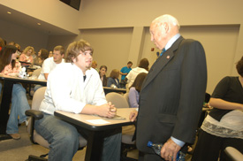 Chick-fil-A founder Truett Cathy visits with Union student Kevin Roe prior to Cathy's Nov. 1 address to Union students. (Photo by Morris Abernathy)