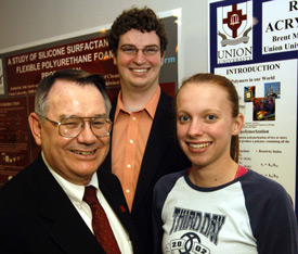 Chemistry students Brent Jones (center) and Kate Ayers (right) were two of six Union students who displayed posters that summarized recent research projects at this year's American Chemical Society national meeting in San Diego. Chemistry professor Charles Baldwin (left) was program chair for the undergraduate portion of the meeting. (Photo by Morris Abernathy)