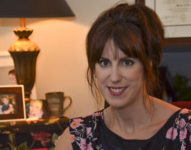 Christine Bailey, director of composition support in Union's English department, has published her first novel, "Girl in the Middle." (Photo by Morris Abernathy)